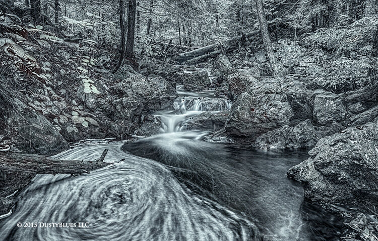 Long exposure allows the water to create special patterns in this mountain stream.